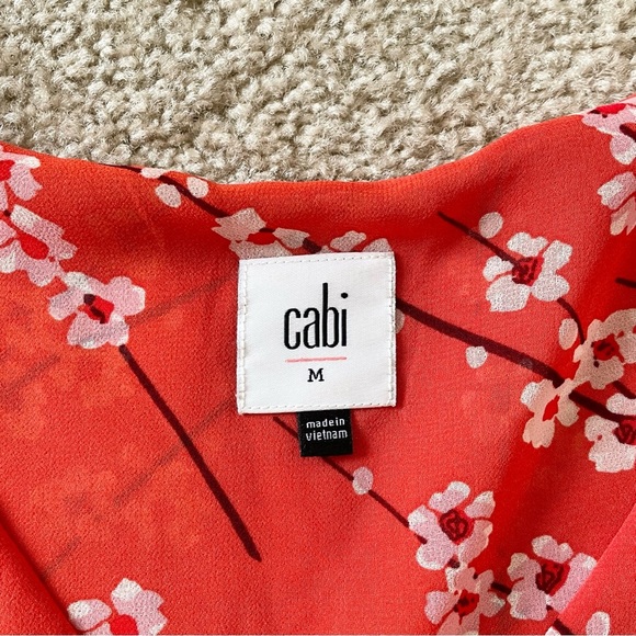🎃 CAbi Tulip Sleeve Orange Blouse with Cherry Blossom Print Medium - Picture 13 of 15